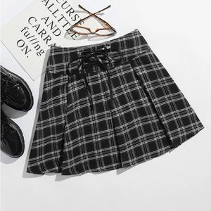 Black plaid skirt